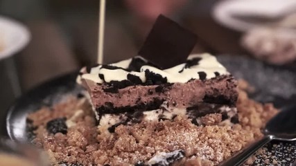 White cream sauce dripping on brownie blondie dessert - Powered by Adobe