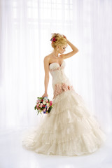 Beautiful fashion model. Sensual bride. Woman with wedding dress