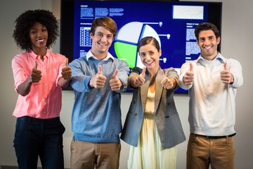 Portrait of business people standing in the conference room