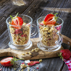 Ready-made granola with dried strawberries and almonds. Healthy breakfast  cereal muesli,   fresh 