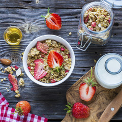 Ready-made granola with dried strawberries and almonds. Healthy breakfast  cereal muesli,   fresh 