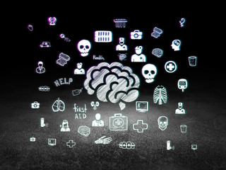 Healthcare concept: Brain in grunge dark room