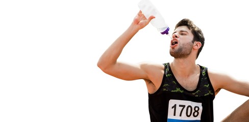 Portrait of sportsman drinking 