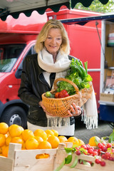 Attractive woman shopping for fresh produce.