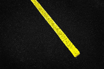 Yellow Stripe on Asphalt Road
