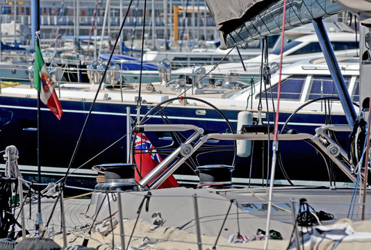 The deck and the rudder of a sailboat