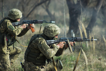 Fototapeta premium Military soldiers at tactical exercises