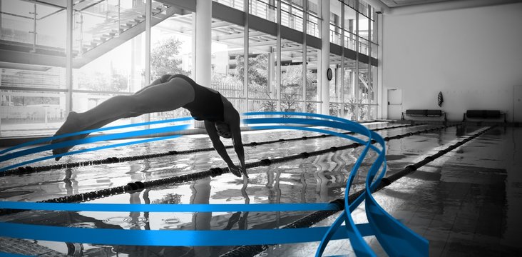 Composite image of woman diving in swimming pool 