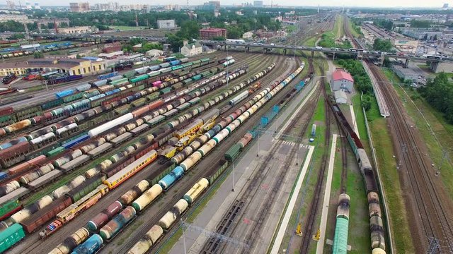 Railway yard with a lot of railway lines and freight trains, Rail freight marshalling yard, Russian Railways.