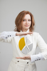 Woman shows a pie chart, circle diagram. Business analytics concept.