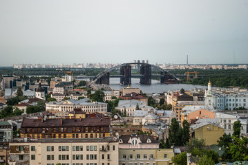 bridge and avenue in modern city / Sunset on the  waterfront.  Evening scene of   with park     green grass  trees at  light