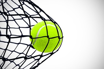 Composite image of tennis ball with a syringe - Powered by Adobe