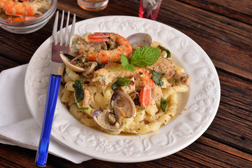 pasta dish with fish and seafood
