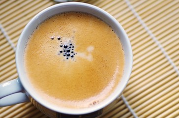 Coffee espresso. Cup of coffee on wooden background. 
