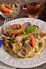 pasta dish with fish and seafood
