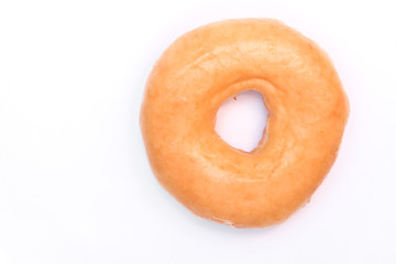 Fototapeta na wymiar Glazed Donut on White