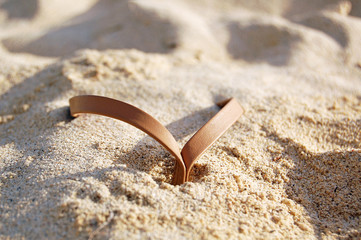Leather thong sandal detail in sand