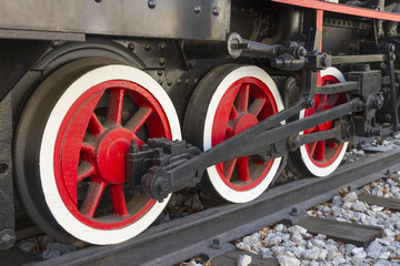 Drive wheels of steam locomotive.