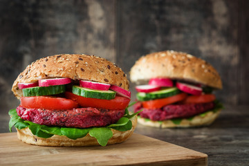 Veggie beet burger on rustic wooden table