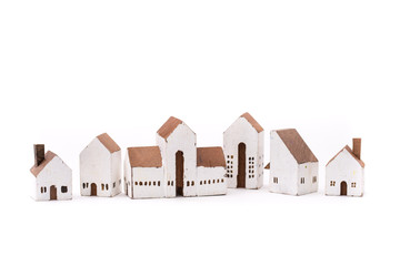 Miniature white wood house on white background