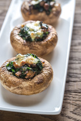 Baked mushrooms stuffed with spinach and cheese