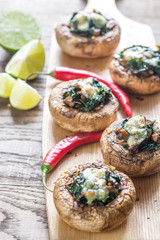 Baked mushrooms stuffed with spinach and cheese