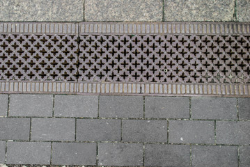 Stone pavement texture. Granite cobblestoned background. Abstract of old cobblestone close-up.