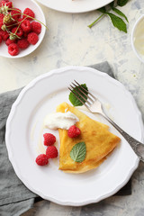 summer pancake with cream and berries