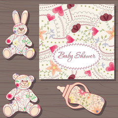 Baby shower on wooden background