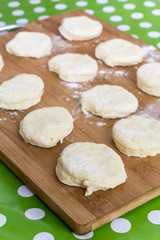 Grandmothers kitchen raw dough on the wooden board