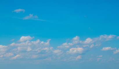 cloudy  with sun shines blue sky