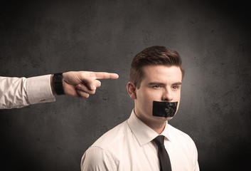 Business hand pointing at employee