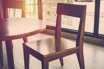 Empty table and chair in coffee shop. vintage filter