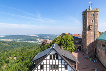 Obraz premium Wartburg Castle, Germany. The courtyard of the fortress and the main tower