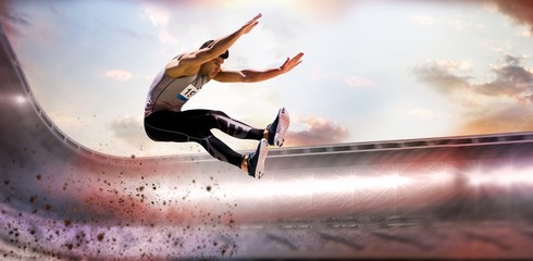 Composite image of portrait of sportsman jumping 