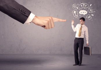 Boss hand pointing at confused employee