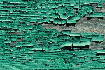 Фон стены с зеленой облупившейся краской