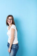 Teenage Girl with glasses smiling.
