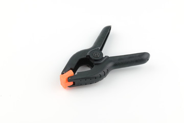 close up black palstic clamp, top view