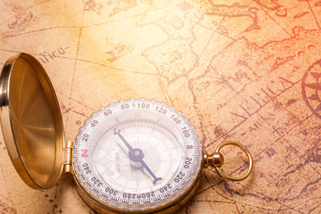 Vintage compass on map