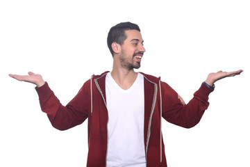 Fototapeta premium Potrait of young latin man offering something.
