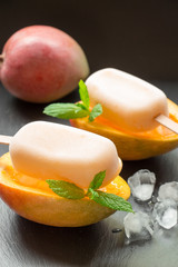 Mango sorbet ice cream popsicles.