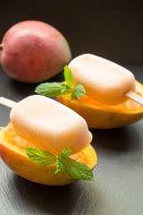 Mango sorbet ice cream popsicles.