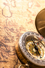 Fototapeta na wymiar Vintage compass on map.