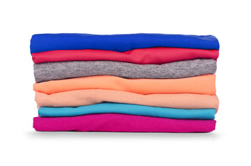 Pile of colorful clothes isolated on white background