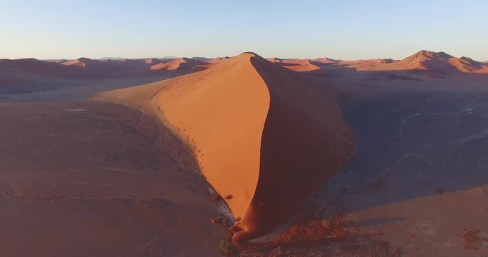 4K aerial view of parabolic sand dunes inside the Namib-Naukluft National Park 