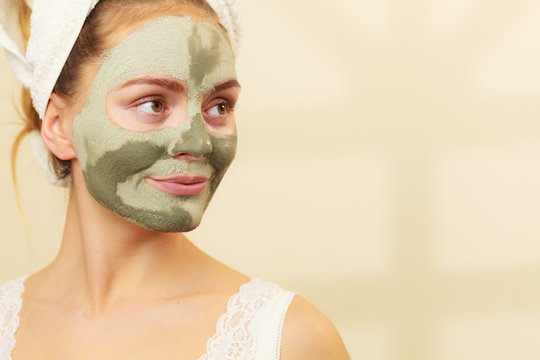 Woman Face With Green Clay Mud Mask