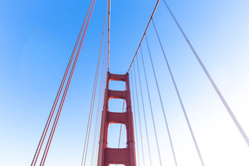 gold gate bridge in blue sky