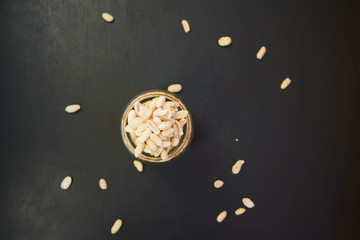 scattered peanuts and glass