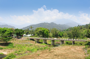 Naklejka premium car bridge across the river and mountain views beautiful skies. in Thailand